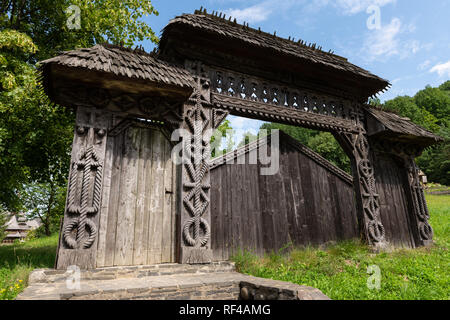 Barsana Monastery Architectural Detail - Traditional Wooden Carved Gate (Maramures, Romania). Stock Photo