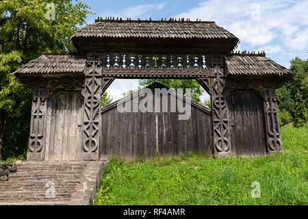 Barsana Monastery Architectural Detail - Traditional Wooden Carved Gate (Maramures, Romania). Stock Photo