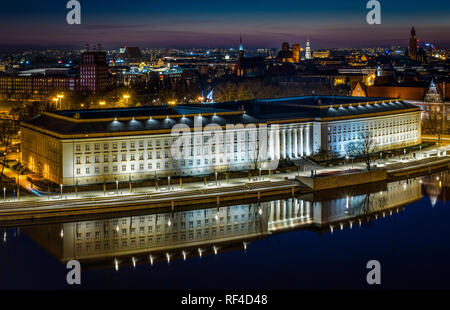 Top view on Lower Silesian Governor's Office and the Odra river at night. Wroclaw, Silesia, Poland Stock Photo