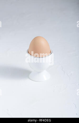 Boiled egg breakfast on white background, copy space Stock Photo