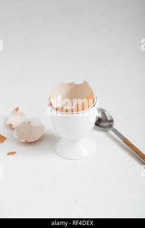Empty eg shell or eaten eg on white background. copy space Stock Photo
