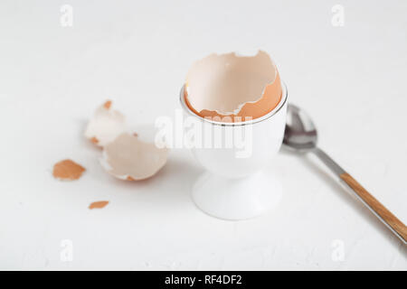 Empty eg shell or eaten eg on white background. copy space Stock Photo