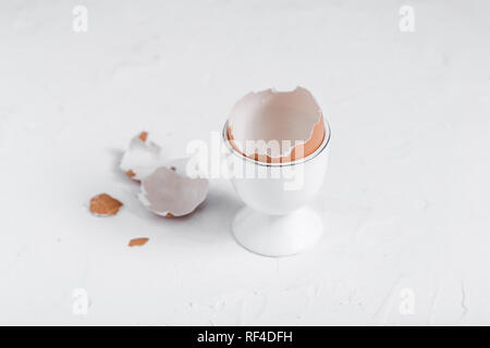 Empty eg shell or eaten eg on white background. copy space Stock Photo
