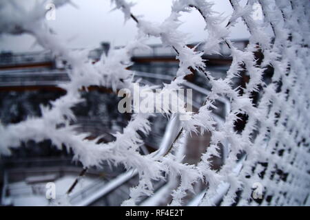 Frosty texture on the fence in Black Forest. Tree tower in Bad Wilbad. Frosty fence. Stock Photo