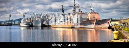 Decommissioned Navy ships, sometimes called the 'mothball fleet', at an east coast port. Stock Photo