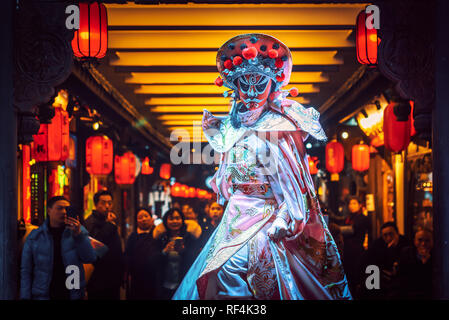 Chengdu, Sichuan Province, China - Jan 19, 2019: Chinese actress performs a public traditional face-changing art or bianlian onstage at Chunxifang Chu Stock Photo