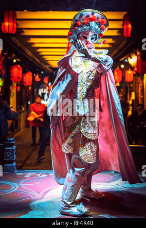 Chengdu, Sichuan Province, China - Jan 19, 2019: Chinese actress performs a public traditional face-changing art or bianlian onstage at Chunxifang Chu Stock Photo