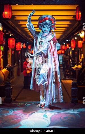 Chengdu, Sichuan Province, China - Jan 19, 2019: Chinese actress performs a public traditional face-changing art or bianlian onstage at Chunxifang Chu Stock Photo