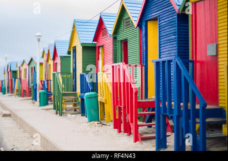 These colorful beach huts in Saint James on False Bay, Cape Town, Western Cape Province, South Africa are icons of summer beach holidays in Cape Town. Stock Photo
