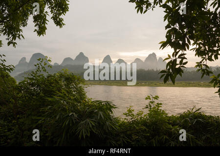 Sunrise over karst mountain and river Li in Yangshuo China Stock Photo