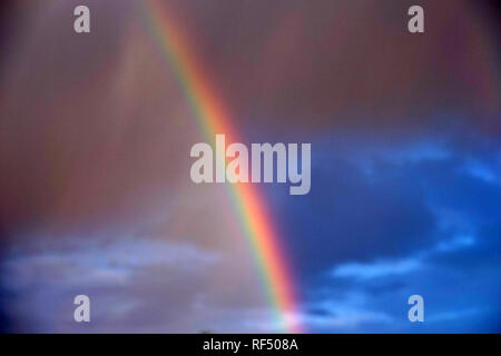 A rainbow appears in Phoenix, Arizona after a rain storm. Stock Photo