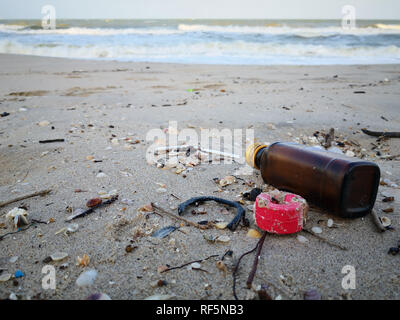 Plastic bottles and other garbage washes up on Songkhla beach. Stock Photo