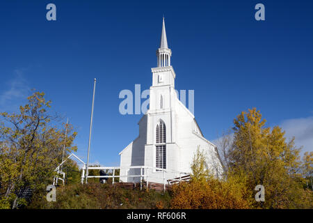 An old 19th century gothic style Anglican church in the indigenous Cree First Nation town of Stanley Mission, northern Saskatchewan, Canada. Stock Photo