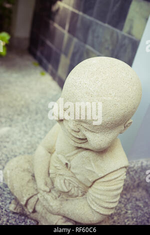 buddha of garden at hotel in thailand. Stock Photo