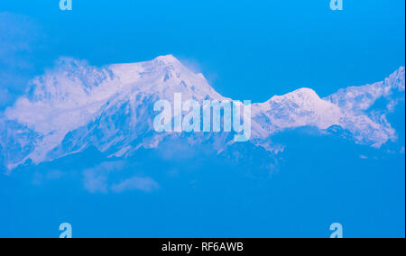 Kanchenjunga Mountain range covered with snow from Kaluk, West Sikkim,India. Stock Photo
