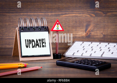 update concept. stationery and computer keyboard Stock Photo
