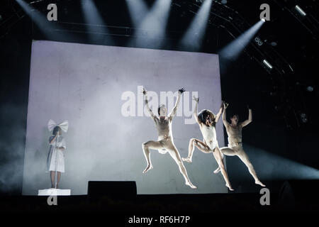 Sia, the Australian pop singer and songwriter, performs a live concert at the Danish music festival SmukFest 2016. Here Sia is surrounded by stage performers. Denmark, 05/08 2016. EXCLUDING DENMARK. Stock Photo