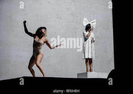 Sia, the Australian pop singer and songwriter, performs a live concert at the Danish music festival SmukFest 2016. Here Sia is surrounded by stage performers. Denmark, 05/08 2016. EXCLUDING DENMARK. Stock Photo