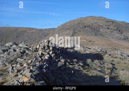 The Wainwright Hart Crag from the Dry Stone Wall at the Col separating it from Dove Crag, Dovedale, Lake District National Park, Cumbria, England, UK. Stock Photo