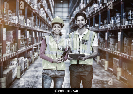Workers are posing and smiling to the camera Stock Photo