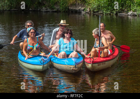 Active seniors people group, canoeing river Otava, South Bohemia, Czech Republic senior friends Stock Photo