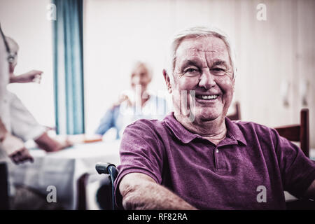 Portrait of a senior man in wheelchair Stock Photo