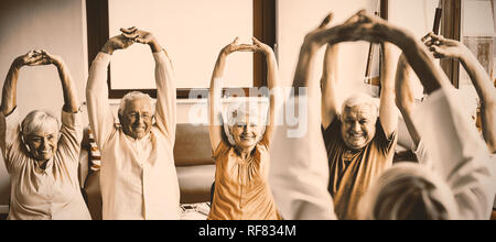 Seniors doing exercises Stock Photo