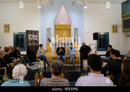 A former Israeli soldier and a member of Breaking the Silence speaking during an event in which former  Israeli soldiers recount their experiences in the Occupied Territories. Breaking The Silence (BtS) is an Israeli Non-Governmental Organization (NGO) established in 2004 by veterans of the Israel Defense Forces (IDF) committed to exposing human rights abuses by the Israeli military in the occupied territories in order to educate the Israeli public about conditions in these areas. Stock Photo