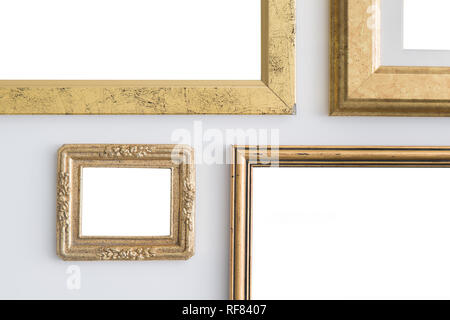 Blank empty golden frames on white background. Art gallery, museum exhibition white clipping path Stock Photo
