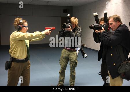 Police officer posing for photographers during a press conference at a new police shooting range, Duesseldorf Stock Photo
