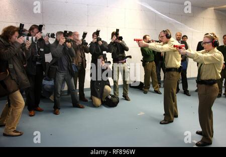 Police officers posing for photographers during a press conference at a new police shooting range, Duesseldorf Stock Photo