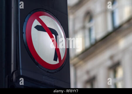Close up on a Do No Turn or No Left Turn sign along a street, with space for copy Stock Photo