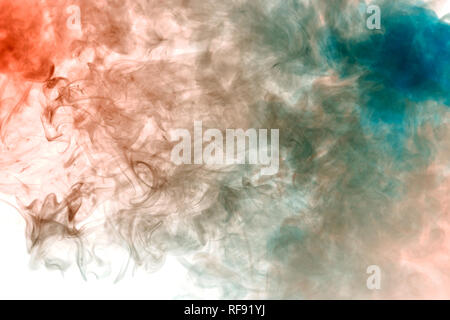 Gray smoke on a white background is highlighted in red and blue with thin jets welded into smooth lines evaporating from the vape. Stock Photo
