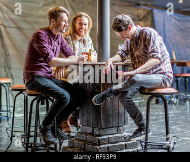 London, England, 13, September 2017, three young men at a bar or pub drinking a beer - newly opened worlds end pub - in Camden, London. Stock Photo