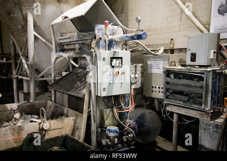 drilling machine. a factory worker operates a woodworking machine. Dashboard in production Stock Photo