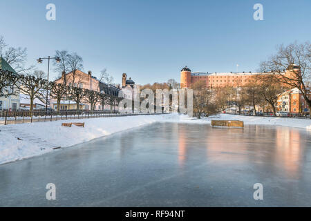 Ice for skating at. Svandammen, with the Castle in the background. Uppsala, Sweden, Scandinavia. Stock Photo