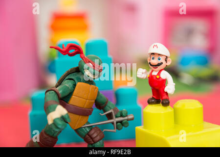 Toy blocks and action figures for children (Super Mario and TMNT) Stock Photo