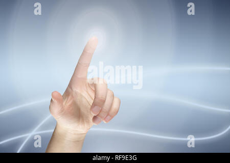 Female finger pressing virtual button Stock Photo