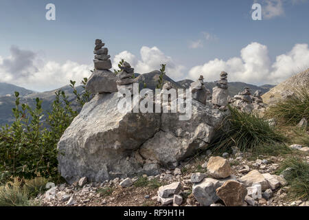 LOVCEN National Park, Montenegro - Bunches of small stones lying on each other embellishing the mountain top Stock Photo