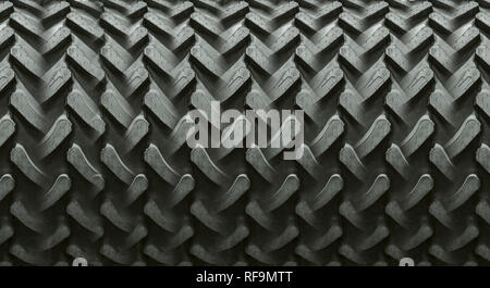 Texture made of tractor tires. Montage. Seems like a compressor roller. Tire background. Stock Photo