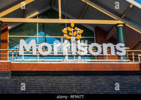 Morrisons logo above the supermarket store at Cheadle Heath, Stockport, England, UK Stock Photo