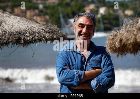 Pere Tantinia cofounder of La Fura dels Baus famous theatre company pose in Soller beach in Mallorca Stock Photo