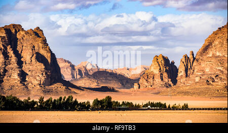 Beautiful landscape consisting of rocky mountains in the middle of the Wadi Rum desert in Jordan. Stock Photo