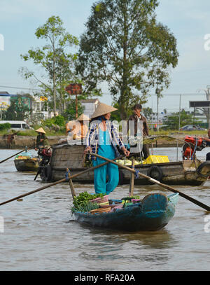 Phong Dien, Vietnam - December 31st 2017. A boat on the river at the Phong Dien Floating Market near Can Tho in the Mekong Delta Stock Photo