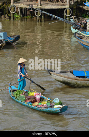 Phong Dien, Vietnam - December 31st 2017. A boat on the river at the Phong Dien Floating Market near Can Tho in the Mekong Delta Stock Photo