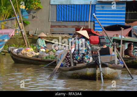 Phong Dien, Vietnam - December 31st 2017. A boat on the river at the Phong Dien Floating Market near Can Tho in the Mekong Delta Stock Photo