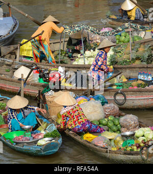 Phong Dien, Vietnam - December 31st 2017. Boat on the river at the Phong Dien Floating Market near Can Tho in the Mekong Delta Stock Photo