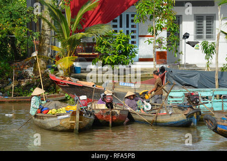 Phong Dien, Vietnam - December 31st 2017. Boat on the river at the Phong Dien Floating Market near Can Tho in the Mekong Delta Stock Photo