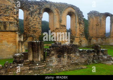Byland Abbey on a wet murky day with low cloud in North Yorkshire Stock Photo