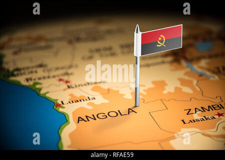 Angola marked with a flag on the map Stock Photo